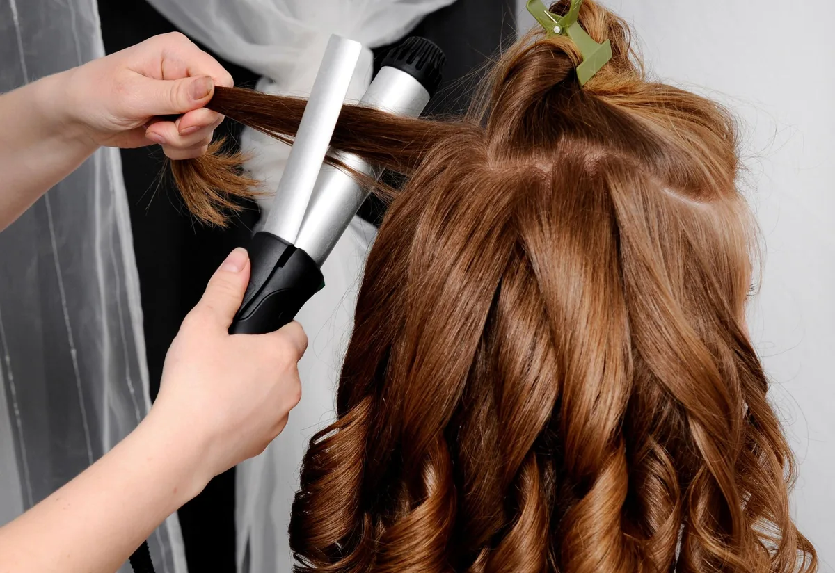 How do I use a curling iron?